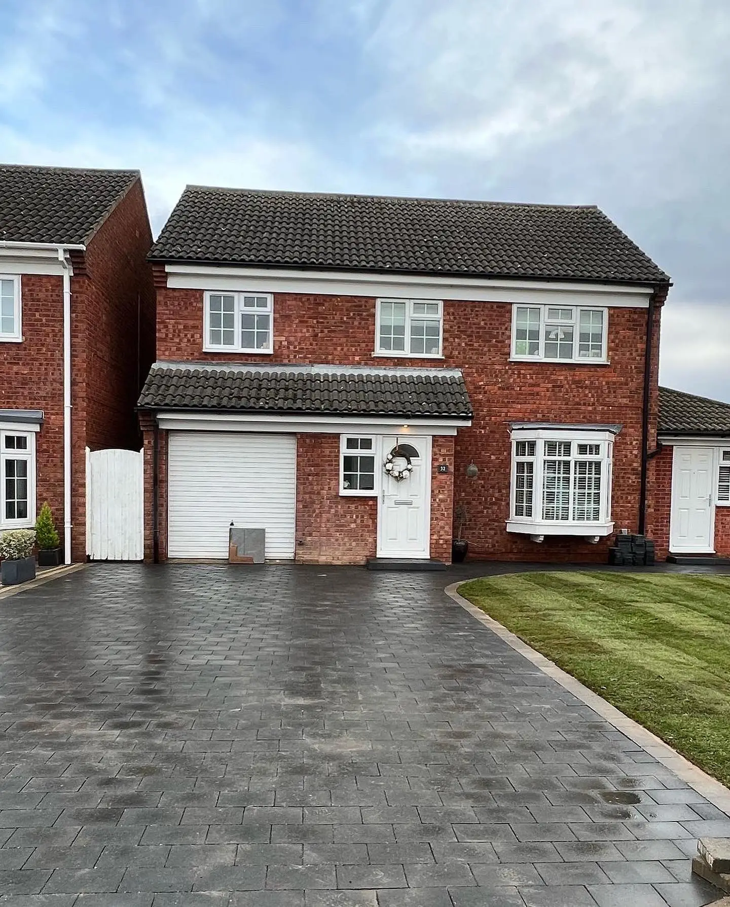 Block paved driveway and new lawn installed by JDS Landscaping in Cambridgeshire